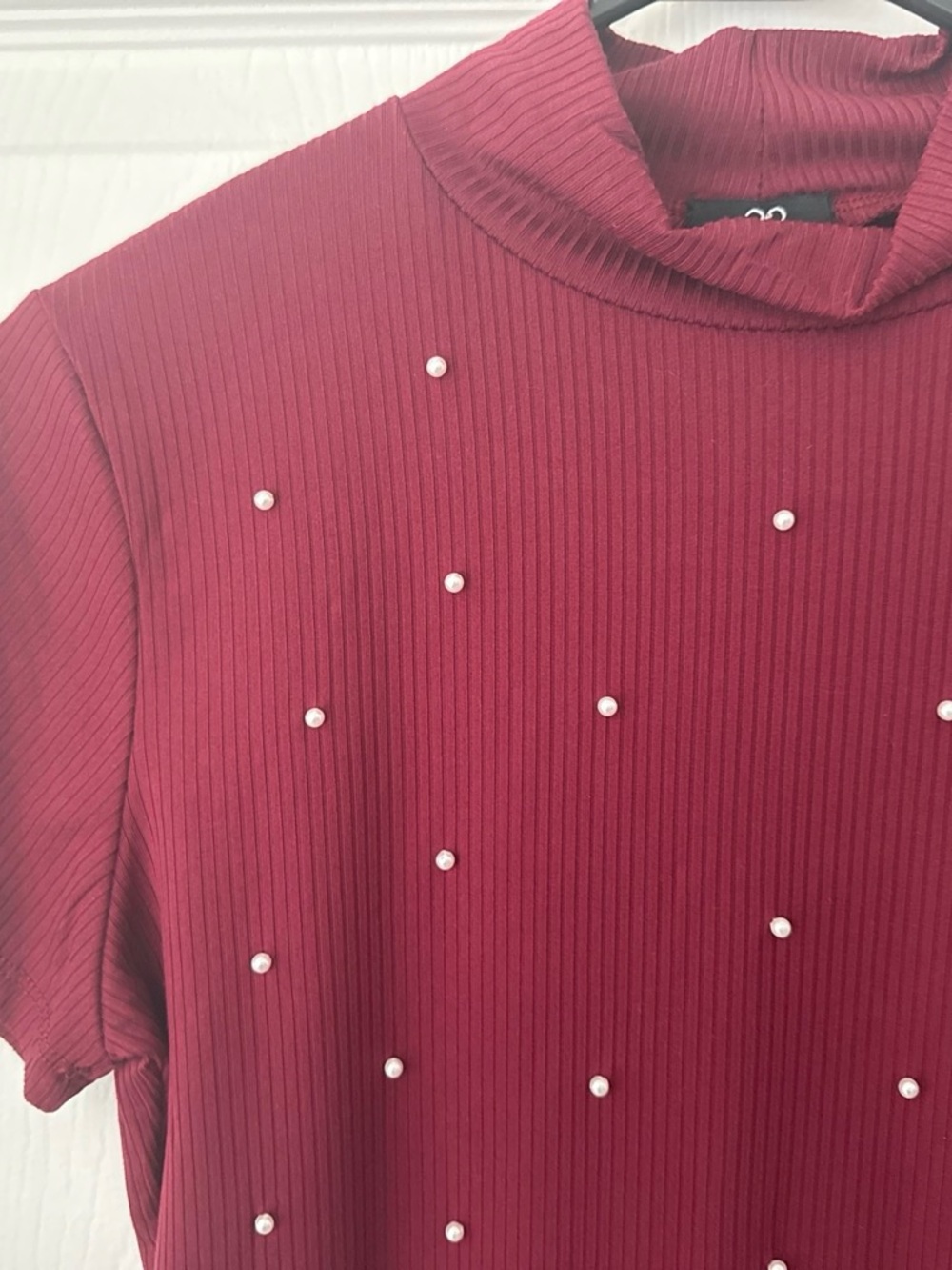 Pearl-Embellished Ribbed Mock Neck Top